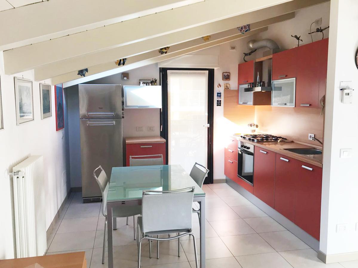 Apartamento Attico With Swimming Pool Lenno Exterior foto